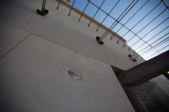 Fifty years later, a bullet hole remains in the wall of the UT Tower's observation deck.